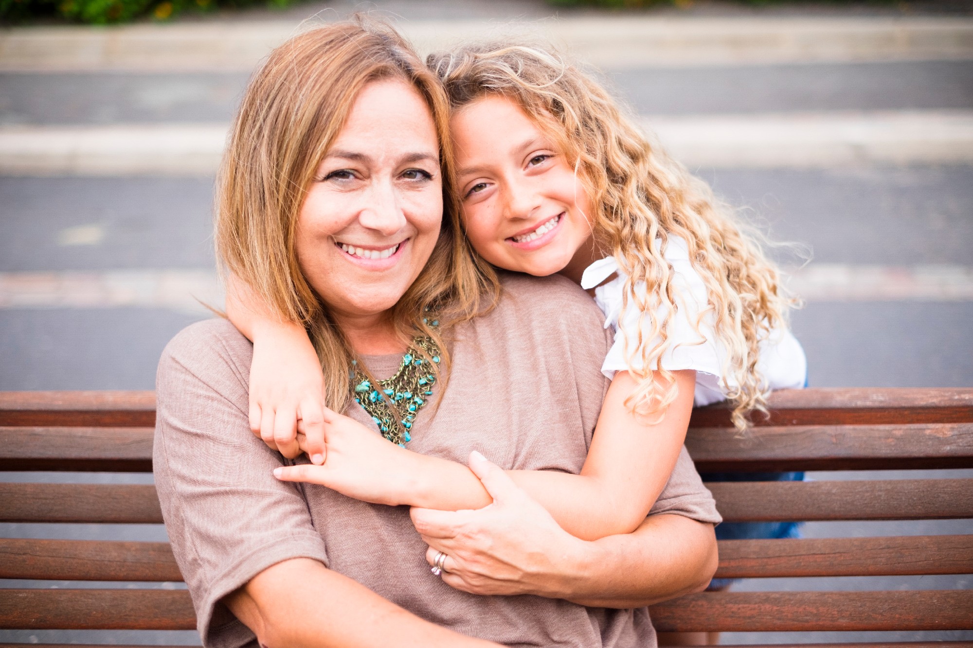 Family Couple Mother And Daughter Together In Outdoor Happy Leis